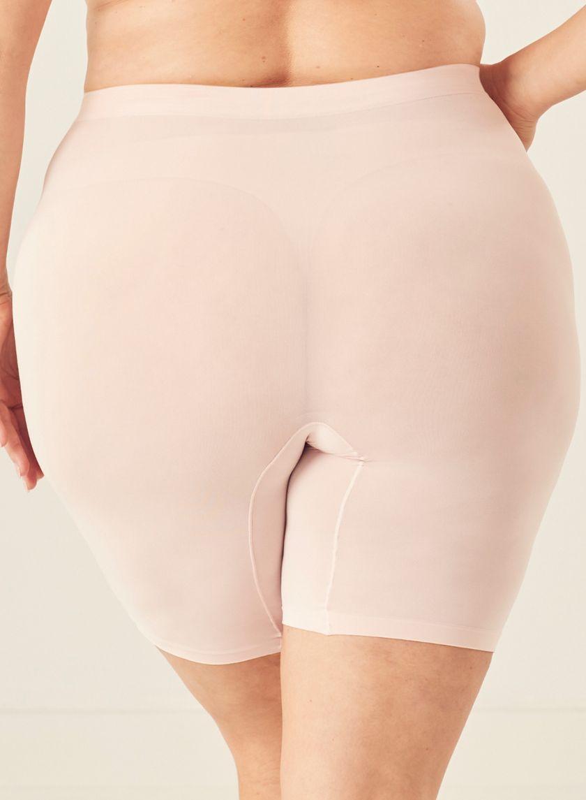 A close up of the back of a woman wearing sheer slip shorts